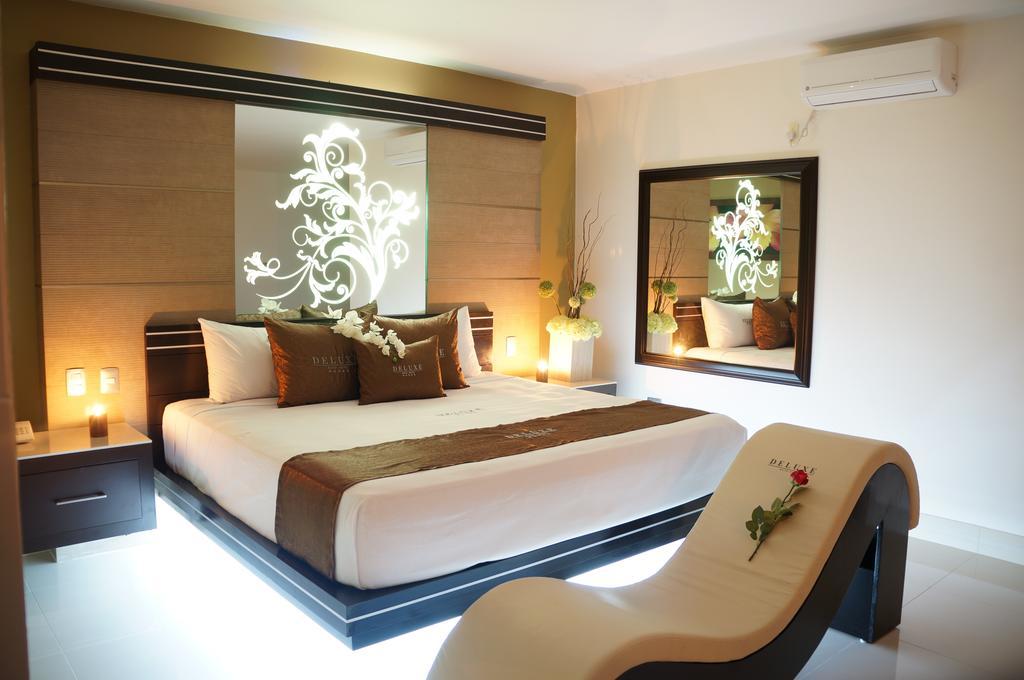 Auto Hotel Deluxe Эль-Альканфор Номер фото